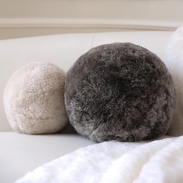 Sheepskin ball cushion cover in grey
